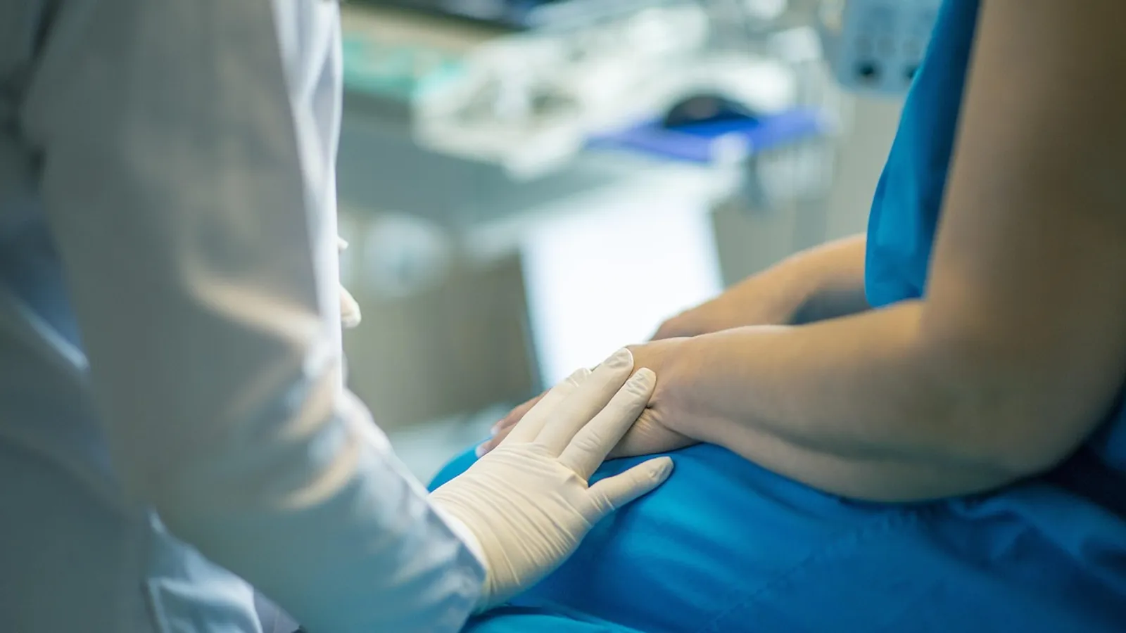 A clinician reviewing an AI-drafted clinical note